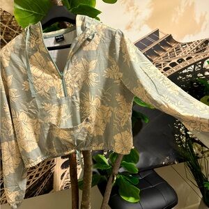 Women’s light green & tan hoodie.